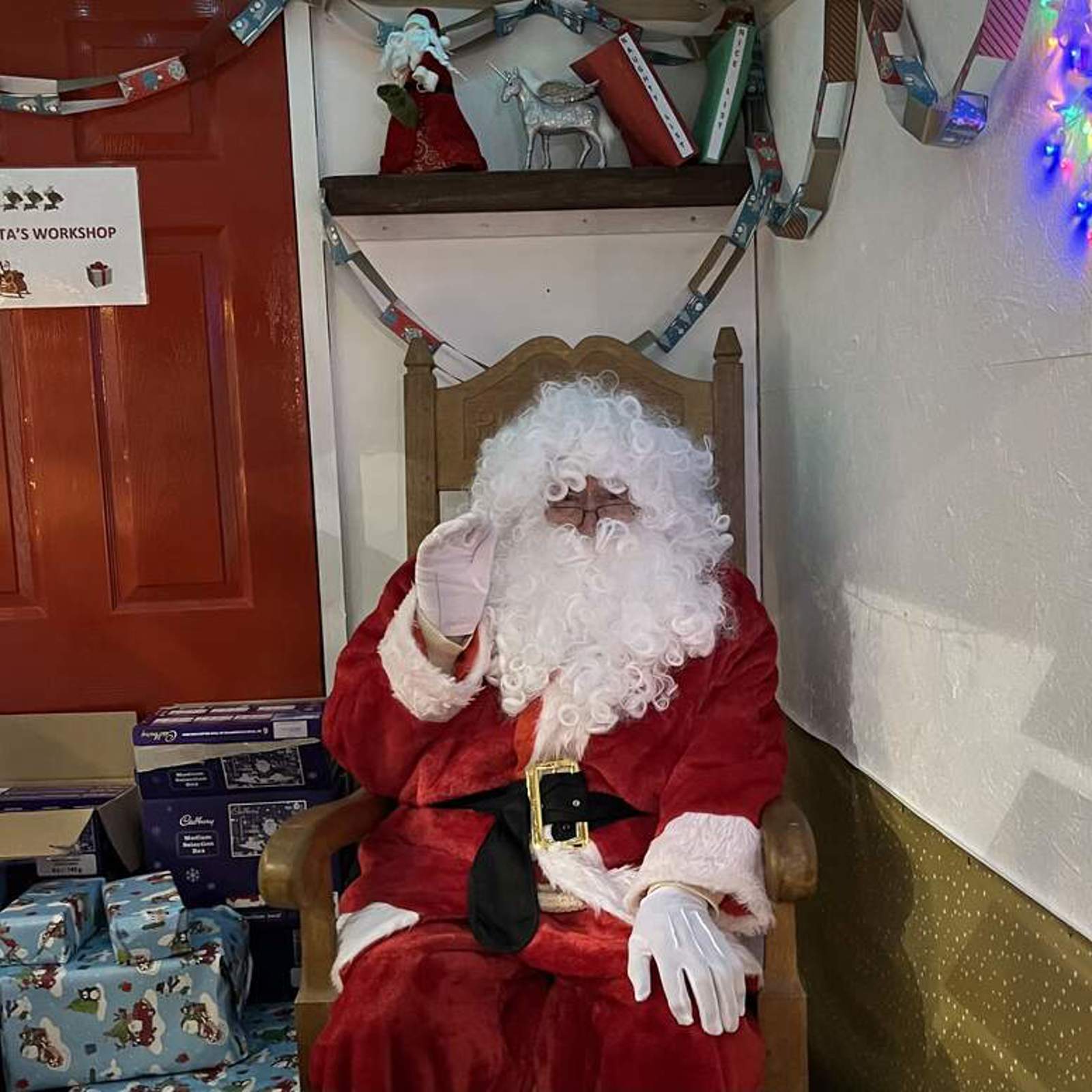 santa-in-his-grotto-at-the-christmas-fair.jpg