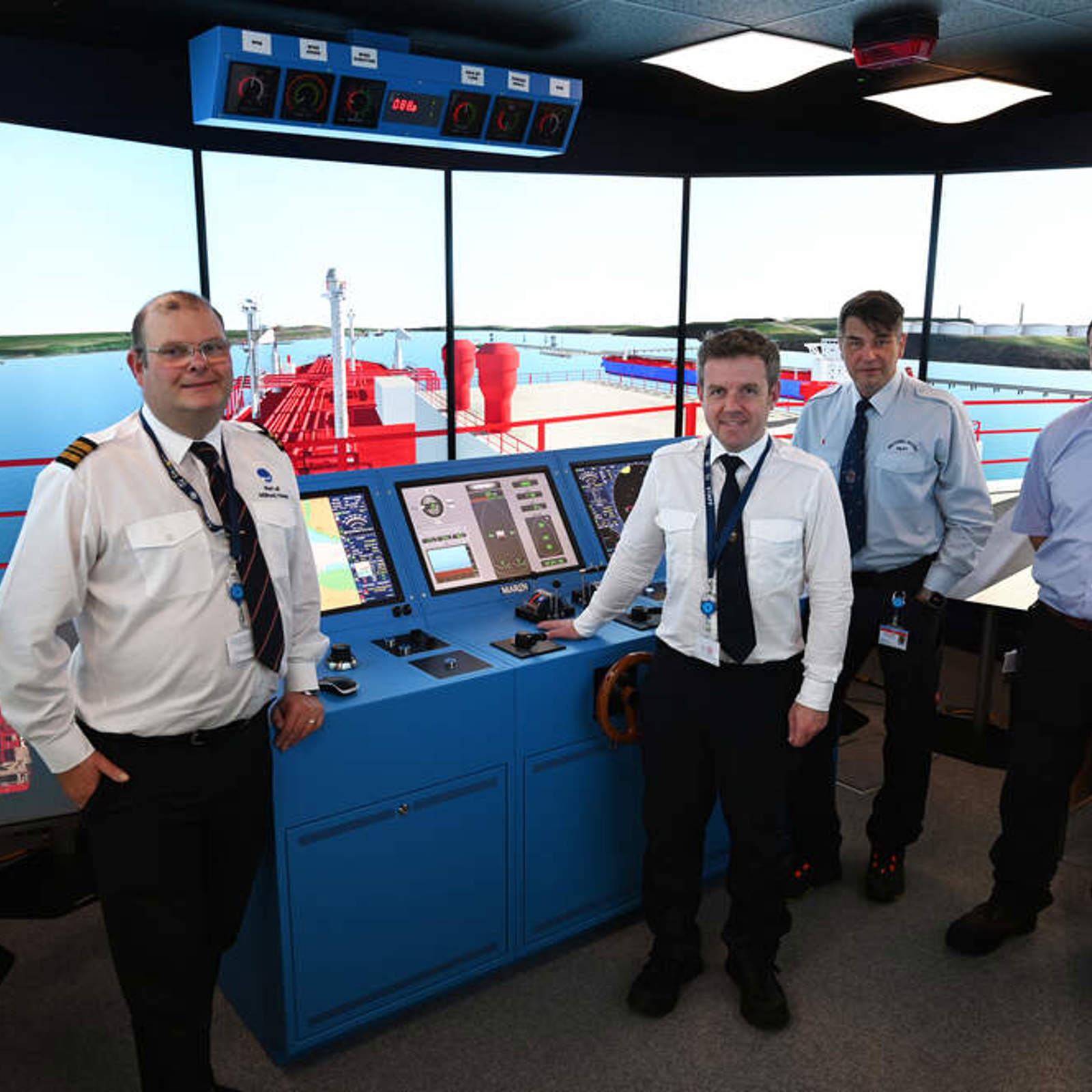 port-staff-david-lockwood-assistant-harbourmaster-captain-ewan-mcnicoll-pilot-captain-andrzej-ostrowski-pilot-and-alex-brown-ict-manager-have-been-instrum.jpg