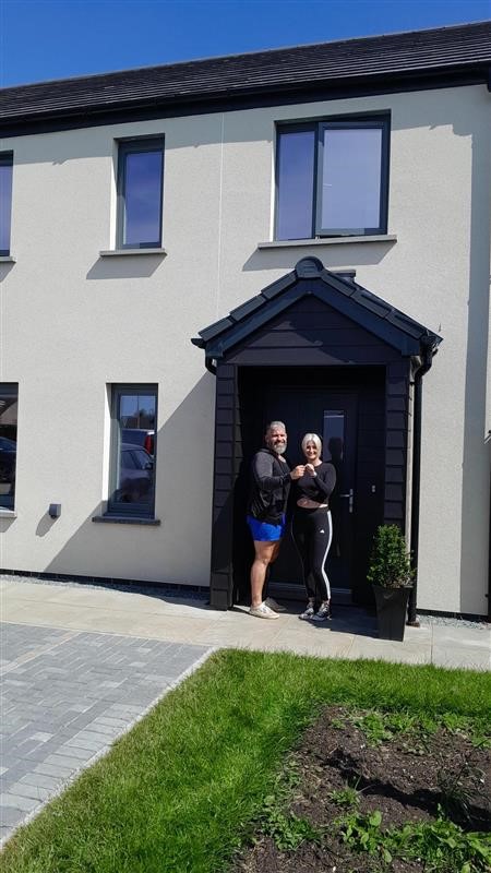 New and returning tenants celebrate completion of Tiers Cross council houses