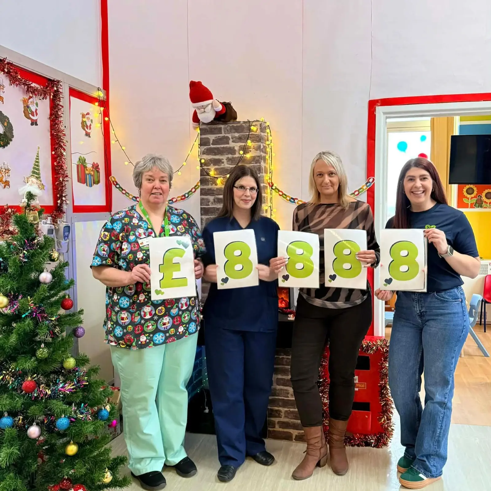 Angharad Ward Staff Celebrate Their Fundraising