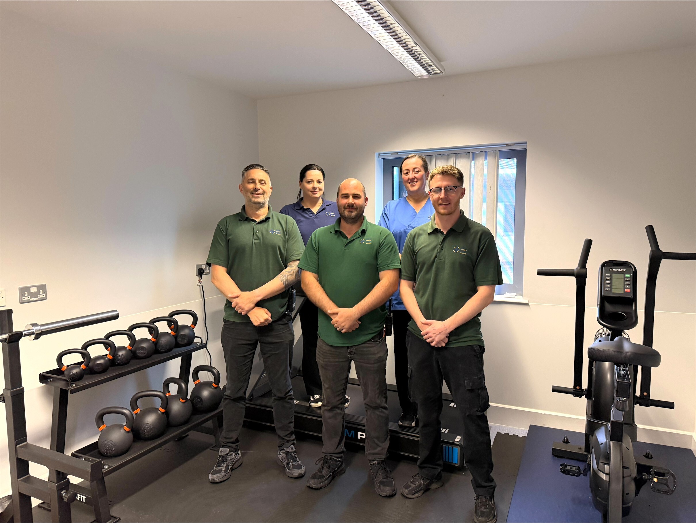 Staff With The New Gym Equipment 1