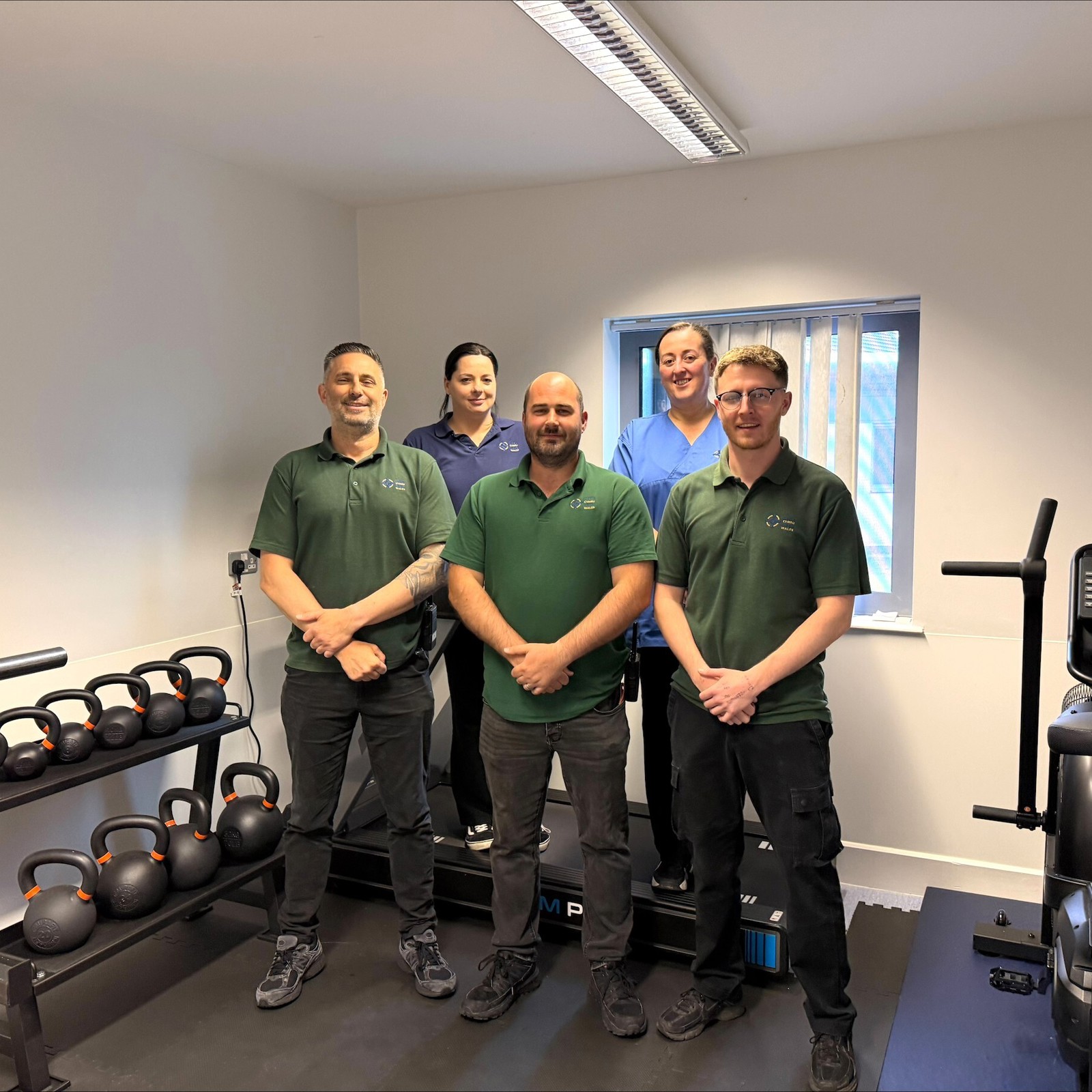 Staff With The New Gym Equipment 1