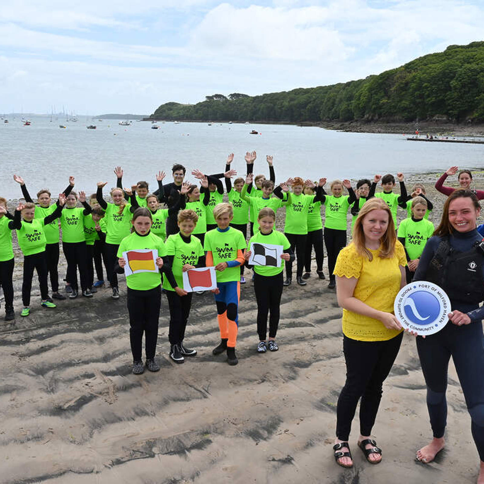 sara-richards-from-the-port-of-milford-haven-and-miyah-periam-senior-instructor-at-windswept-with-year-6-pupils-from-cleddau-reach-school-at-dale-beach.jpg